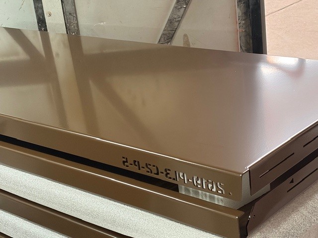 image of a metal sheet which has been powder coated